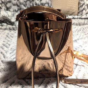 Sassy Jones Metallic Rose Gold Emma bucket bag